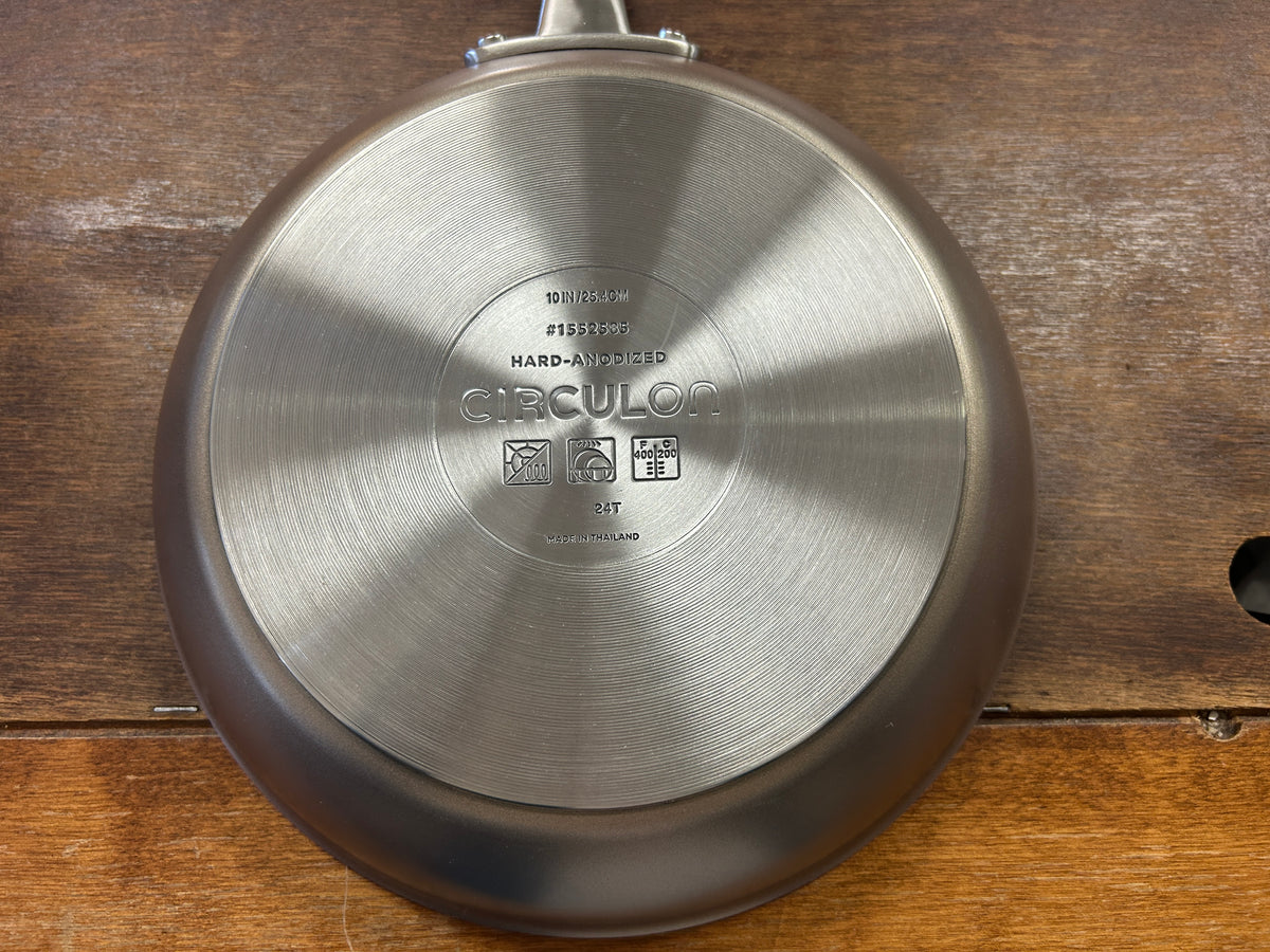 10-inch Circulon skillet base with branding and hard-anodized label