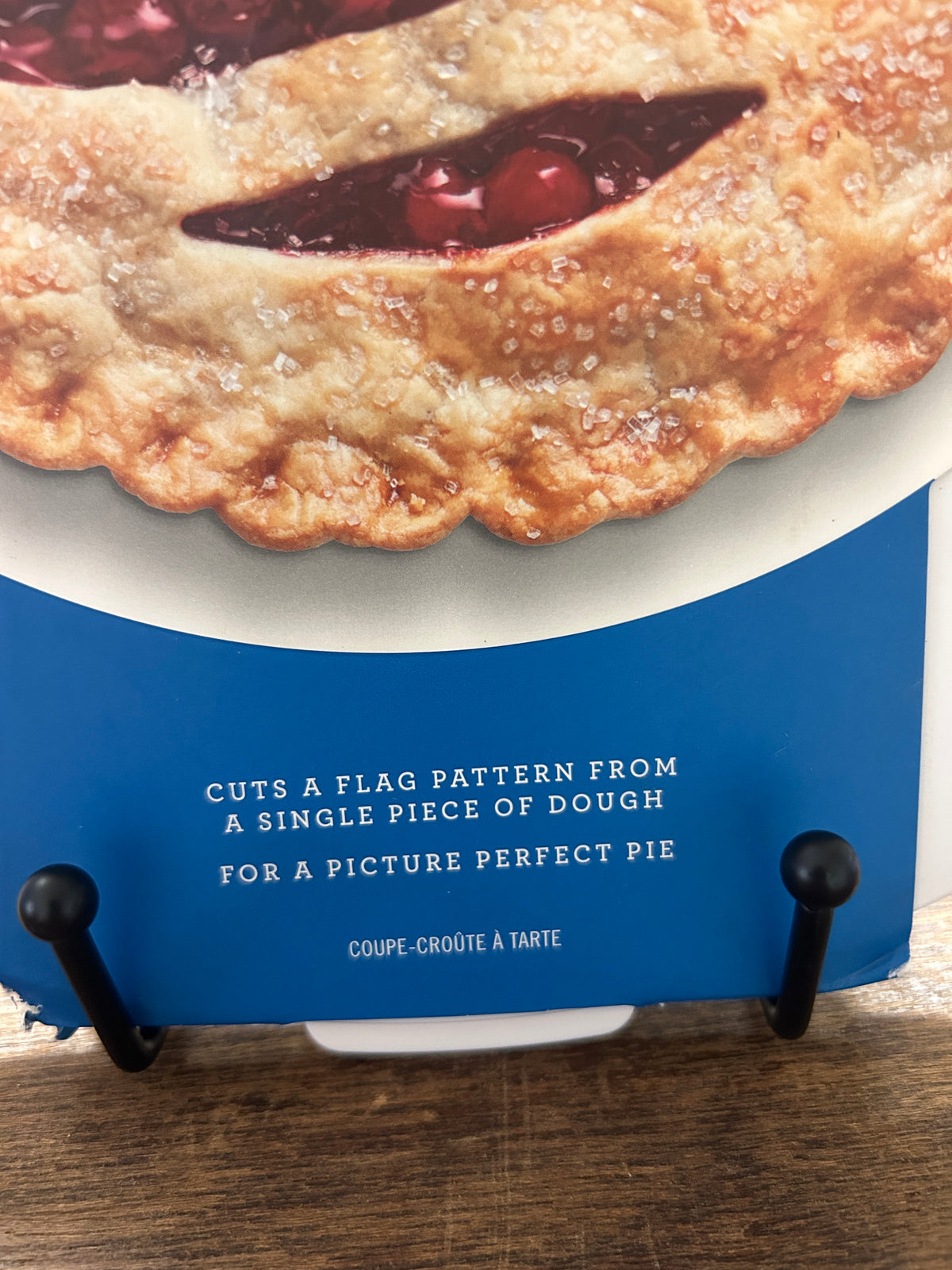 Close-up of flag pattern pie crust cutter on display stand