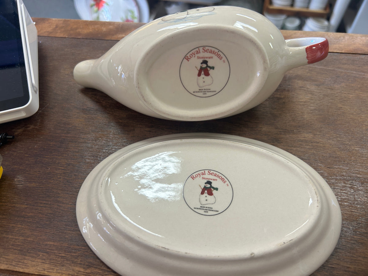 Undersides of the Royal Seasons gravy boat and underplate, with maker's marks