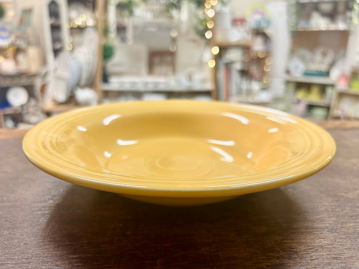 Fiestaware vintage yellow bowl, shallow dish with glossy glaze