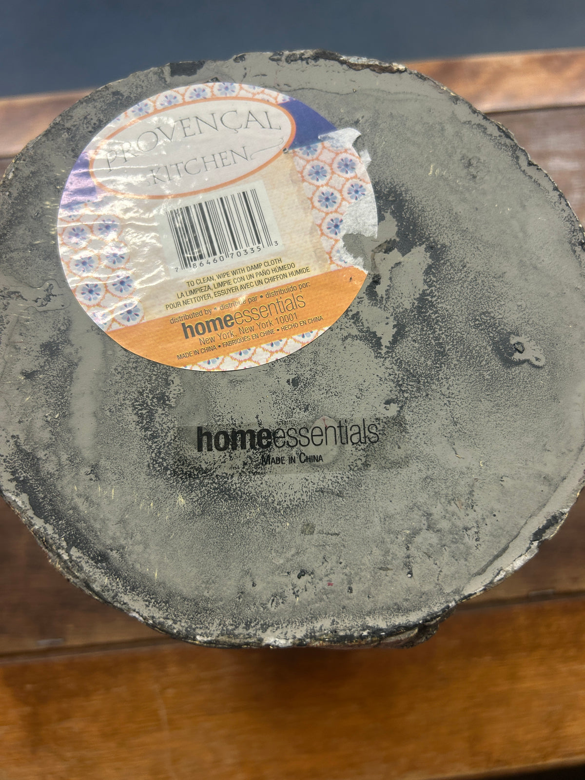 Provencal tree crock base with Home Essentials mark and product label.