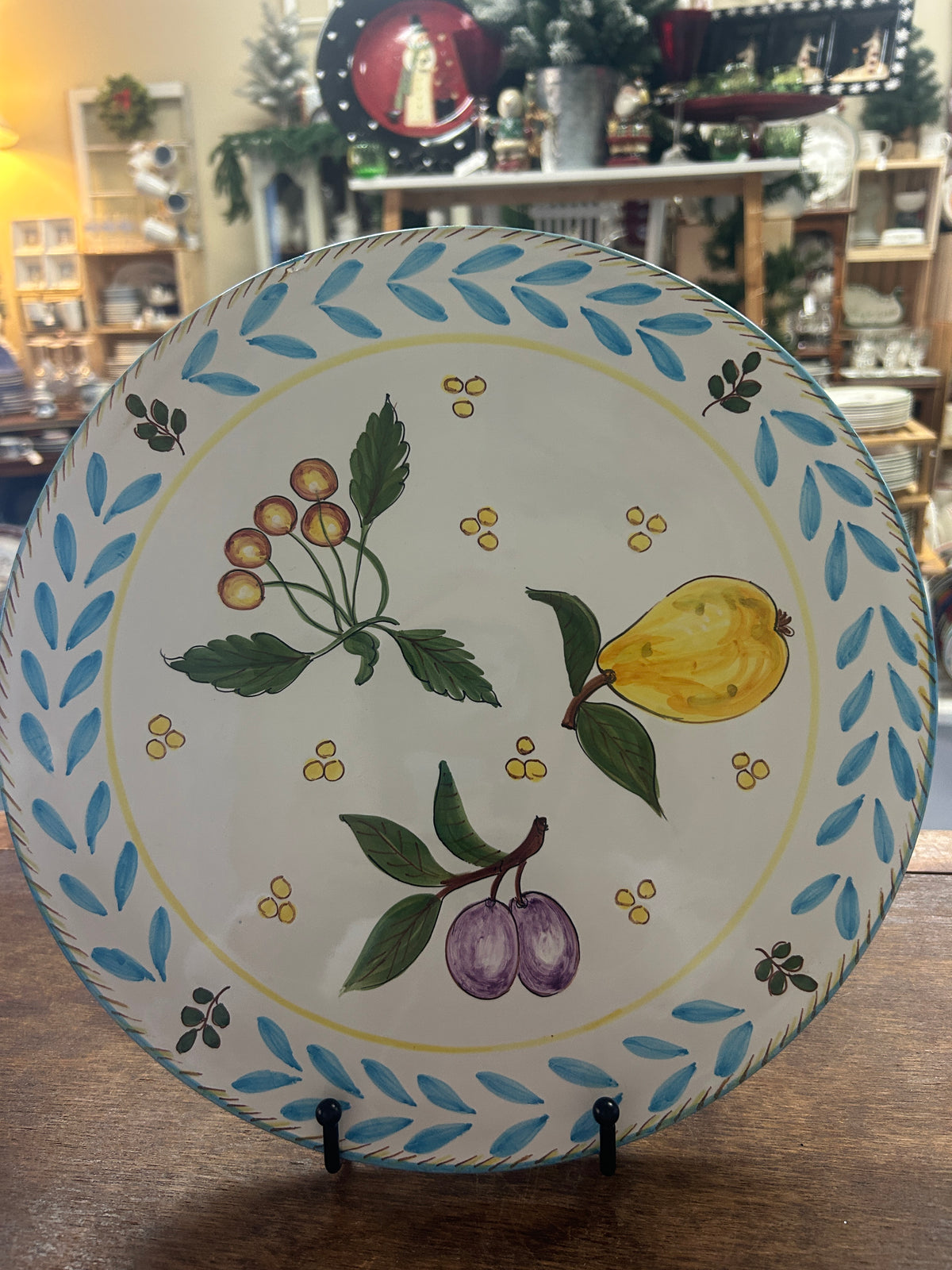 12-inch Deruta fruit footed platter with hand-painted fruit and blue leaf border