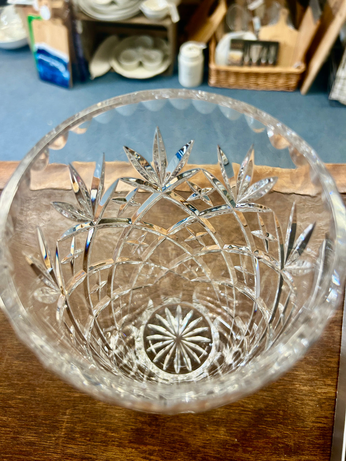Clear glass pineapple-cut vase with starburst base cut and faceted sides