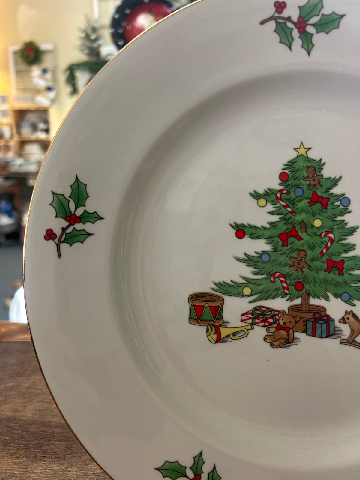 Meiwa holiday plate detail showing a decorated Christmas tree, toys, and holly motifs