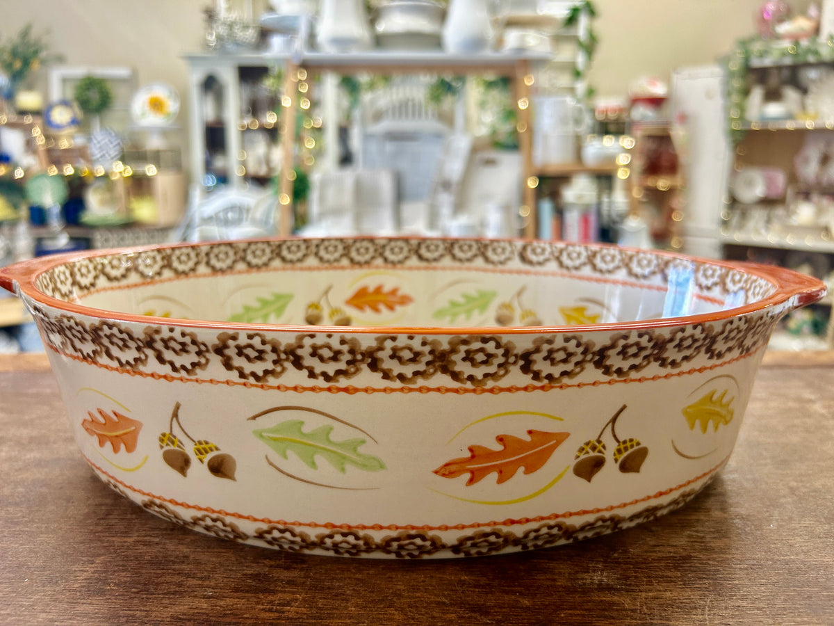 3-qt ceramic baking bowl with orange rim and Harvest multicolor leaf and acorn pattern