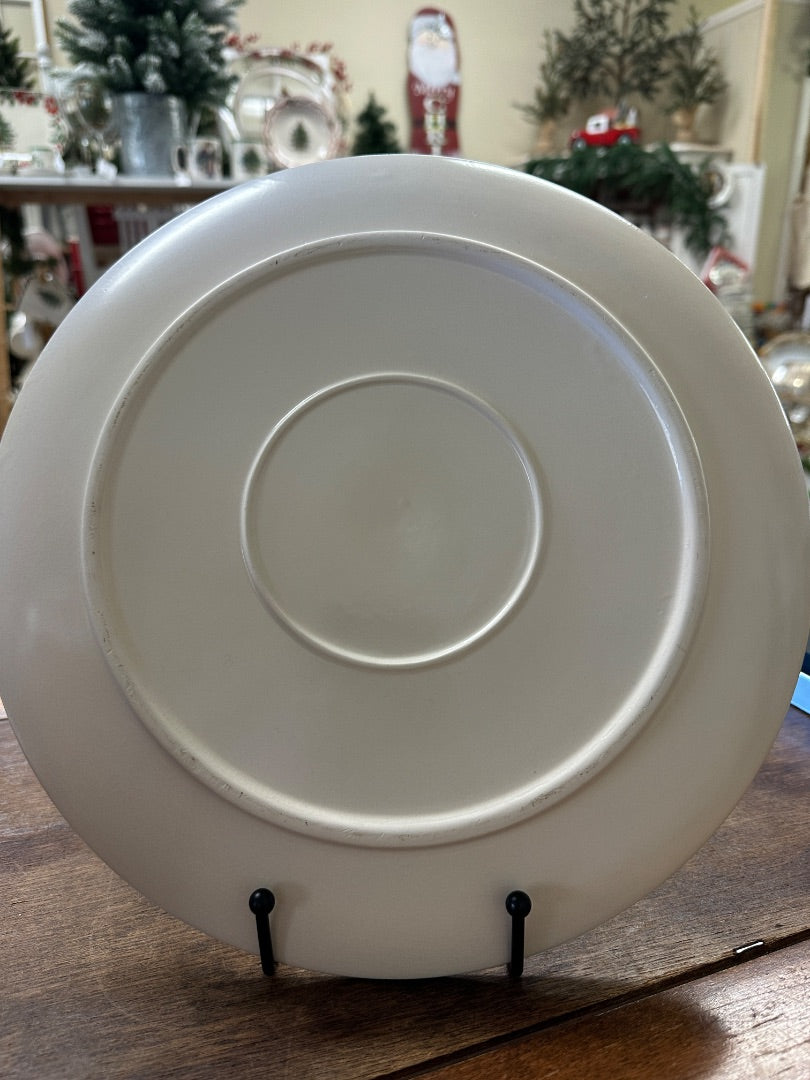 White decorative plate, plain back with circular raised center and display stand
