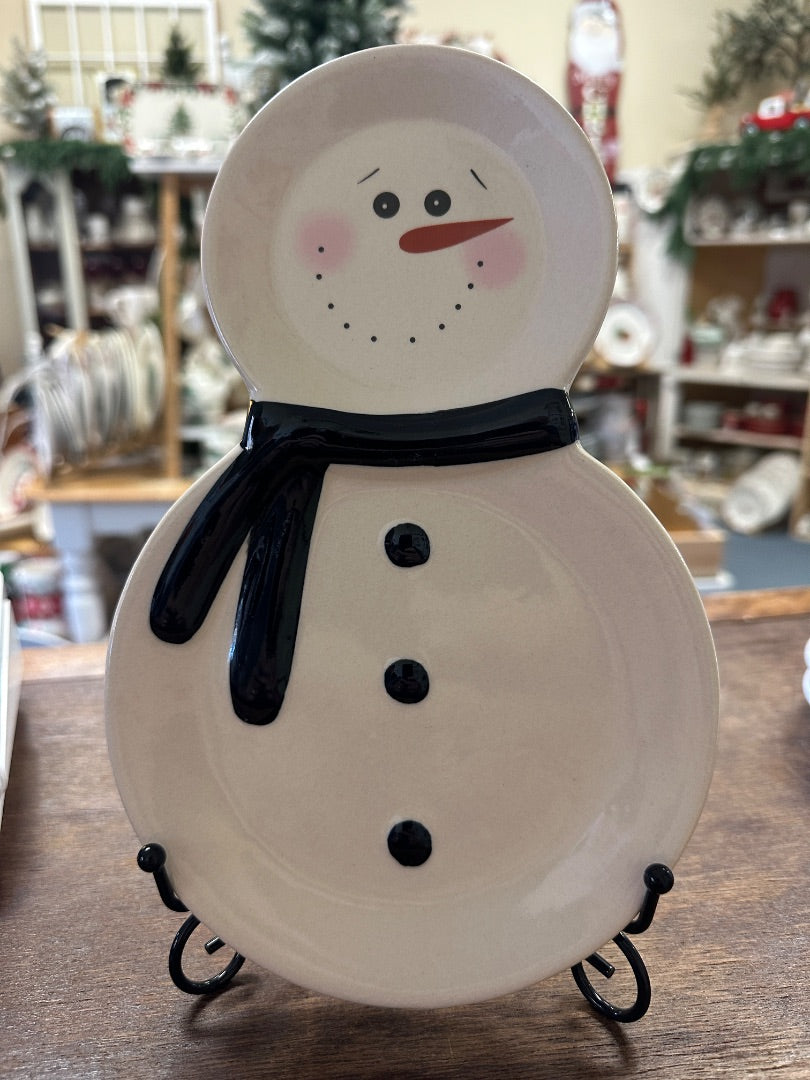 Snowman decorative plate with black scarf, round ceramic, front view