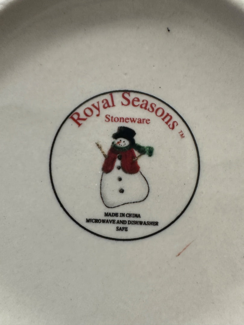 Close-up of Royal Seasons Stoneware logo on ceramic bowl base, Made in China