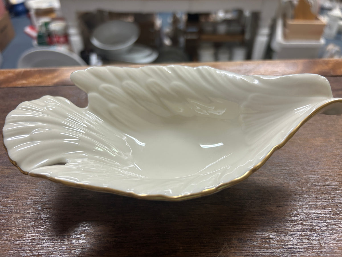 Cream Lenox dove bowl, shallow tray form with gold-edged rim.