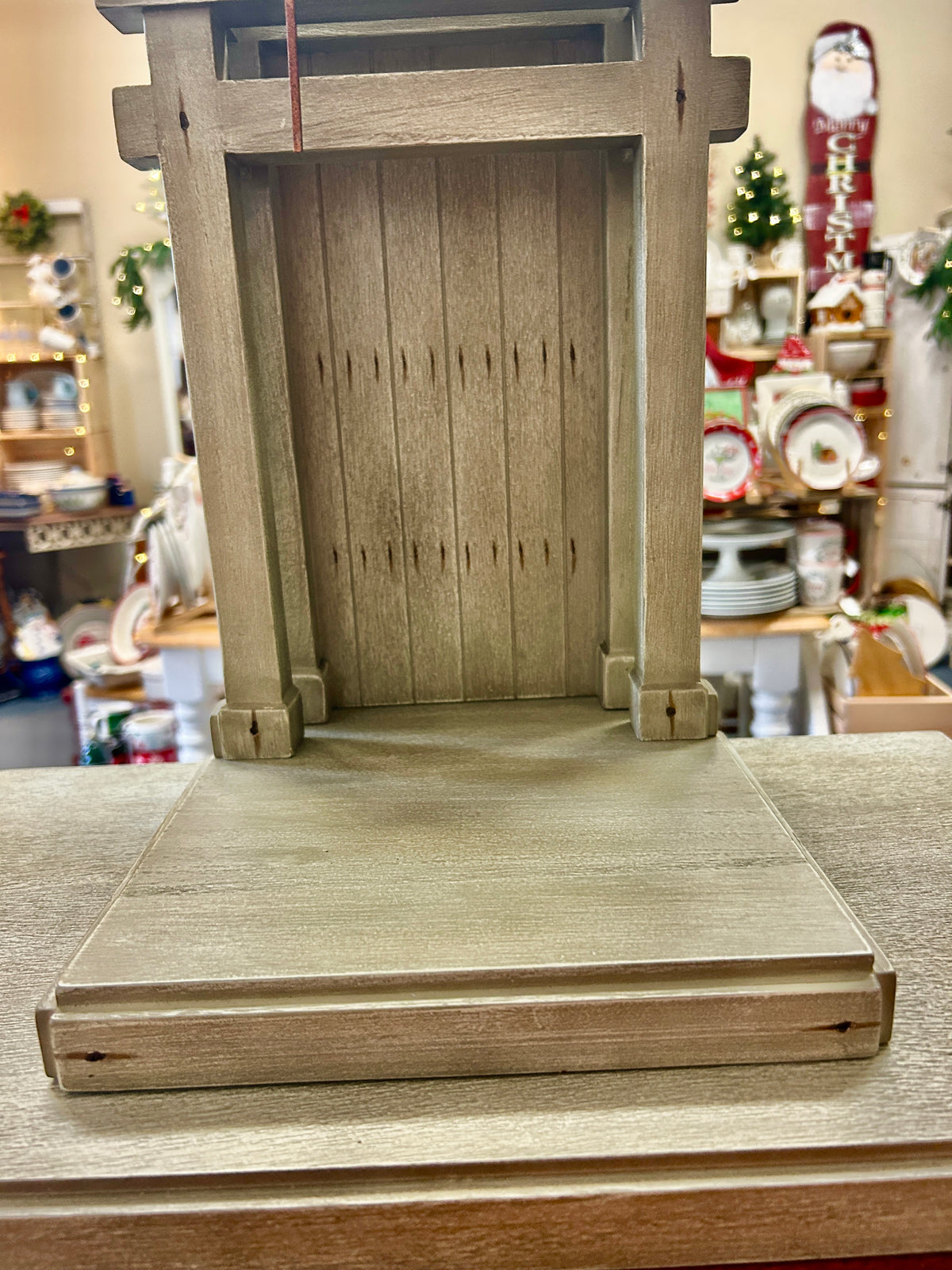 Wooden nativity creche base on flat platform base, arched door front, 20-inch