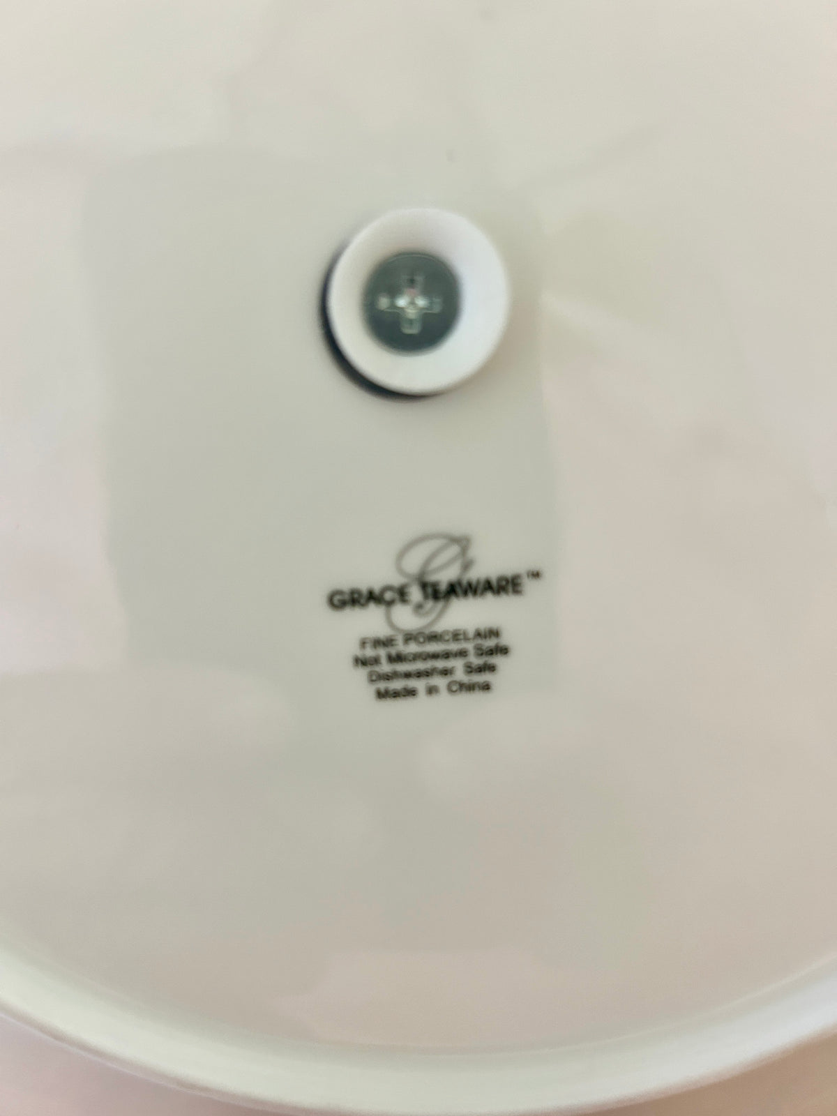 Grace Teaware porcelain stamp on white plate base