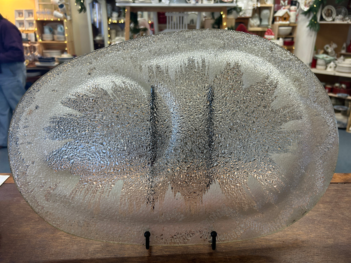 Silver round divided platter with glittery spatter finish and two-part center divider