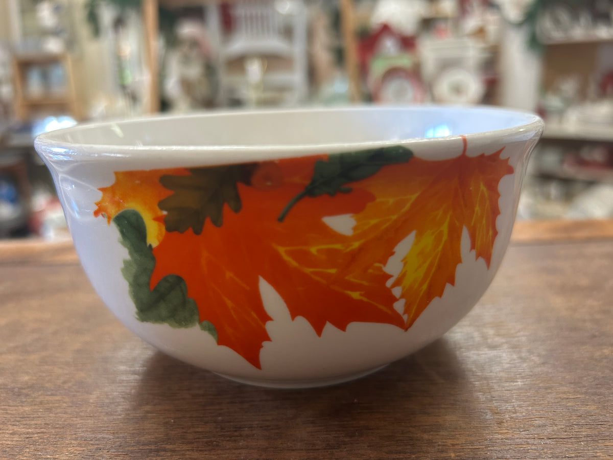 White ceramic serving bowl with multicolor autumn leaves design