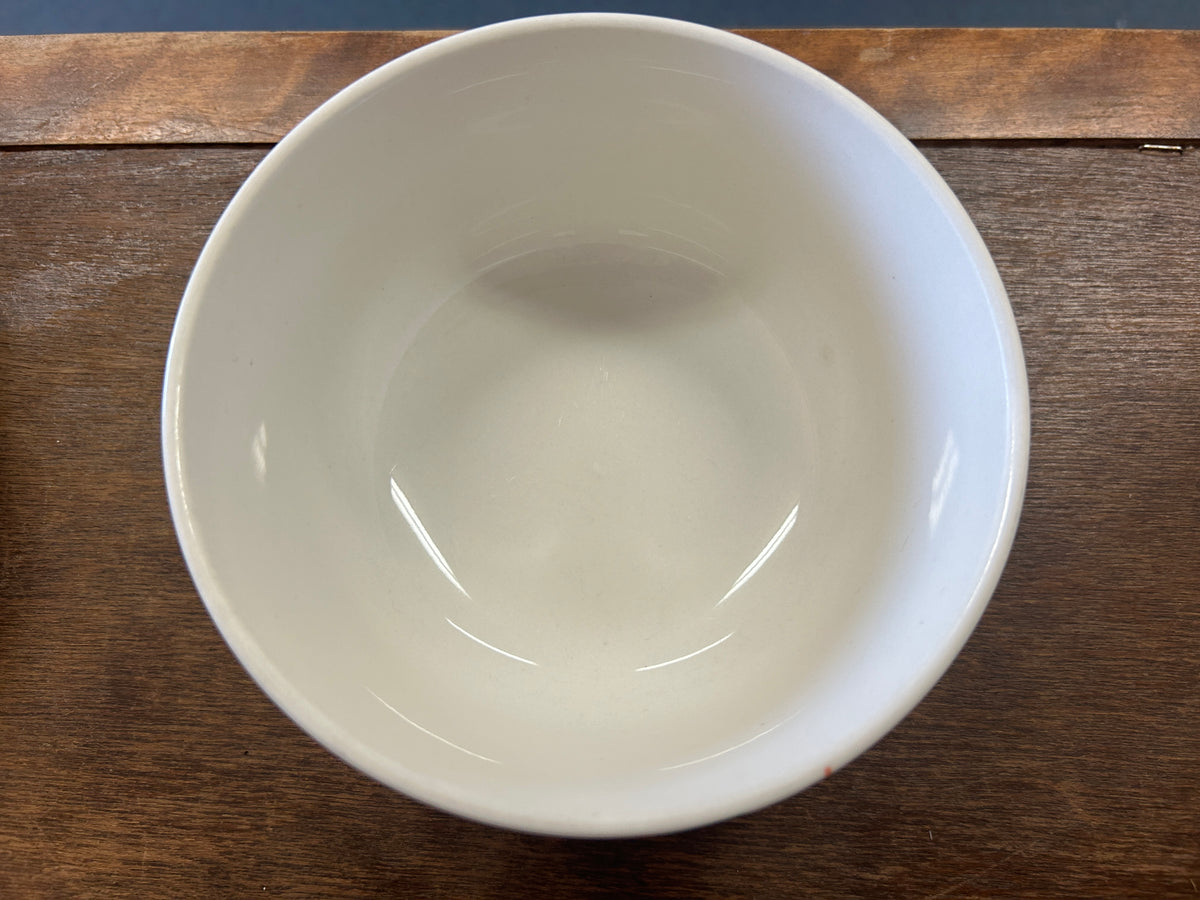 White ceramic bowl, top interior view with glossy finish