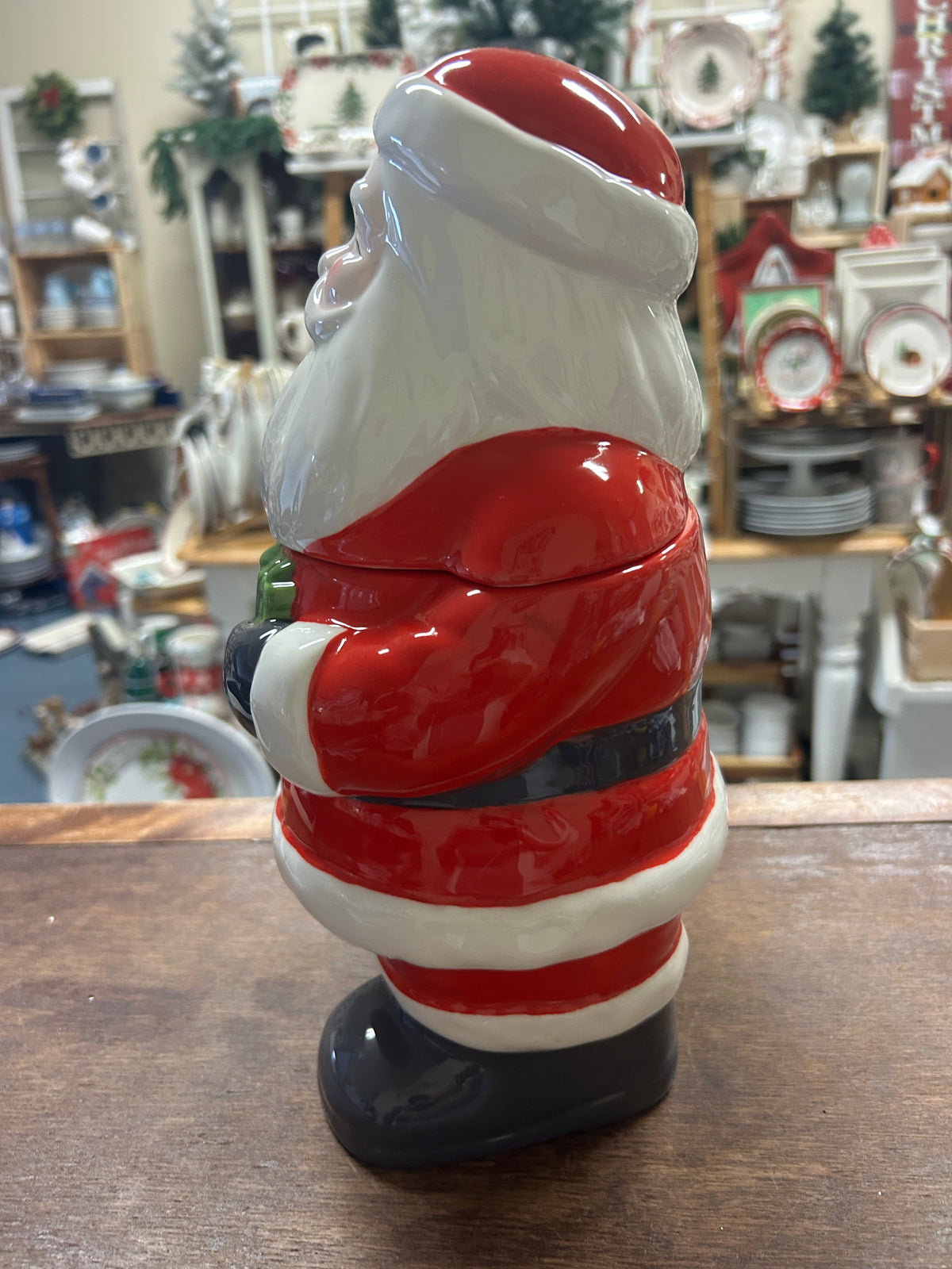 Santa cookie jar side view, white beard and red hat over red-and-white stripes