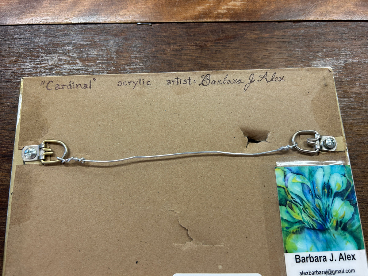 Artwork back with signature, hanging wire, and small bird-themed color panel