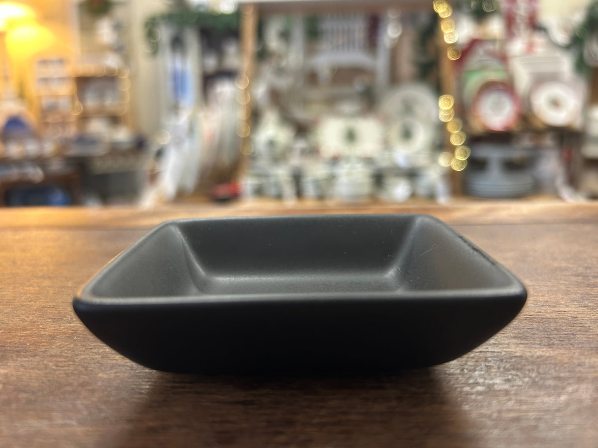Black rectangle bowl, 3-inch shallow dish with rounded corners.