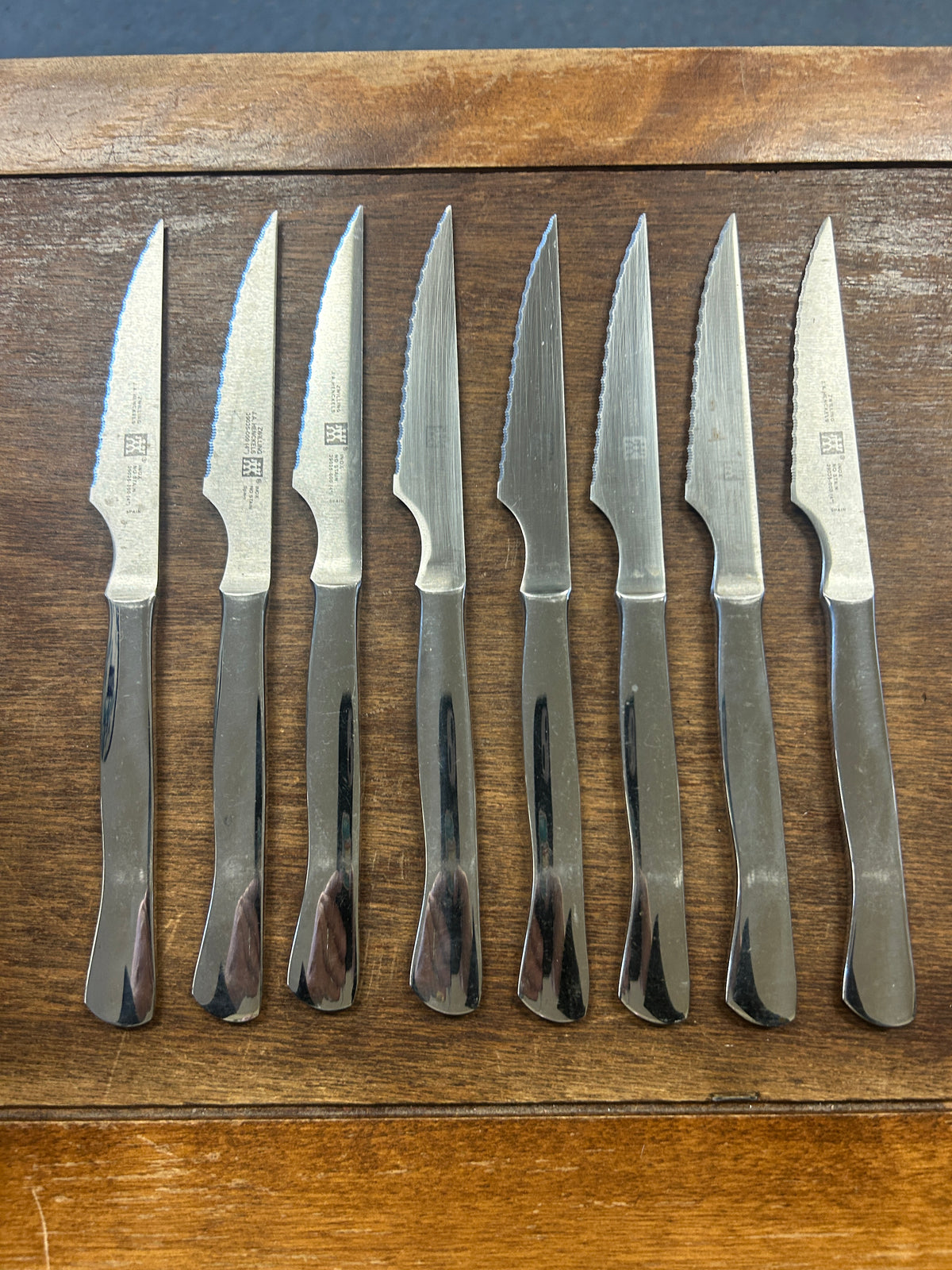 J.A. Henckels steak knives set, 8 stainless blades with curved handles