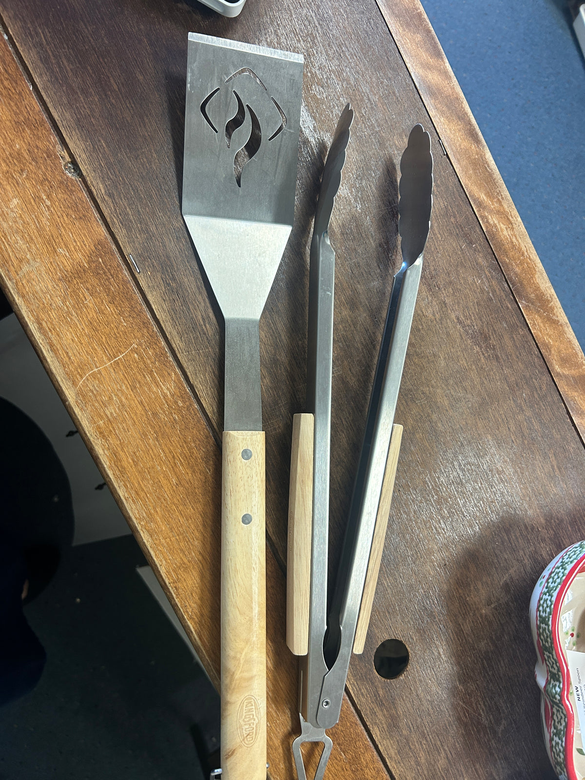 Stainless steel BBQ tongs and spatula with wooden handles