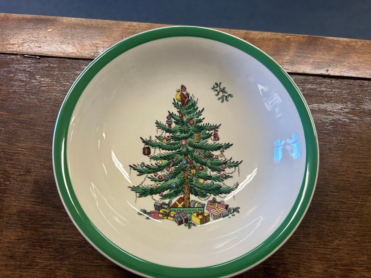 Spode Christmas tree bowl with green edge and tree-and-gifts illustration, white interior