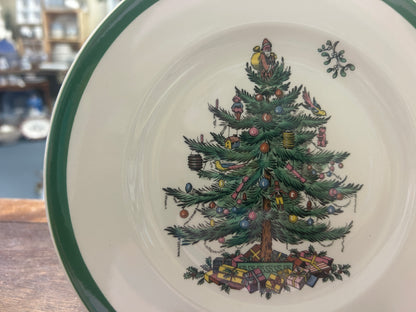 Christmas tree decorative plate with green rim and festive tree illustration