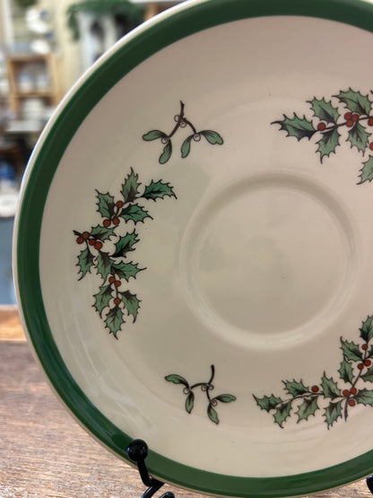 White Spode saucer plate with green rim and holly sprig with berries decoration
