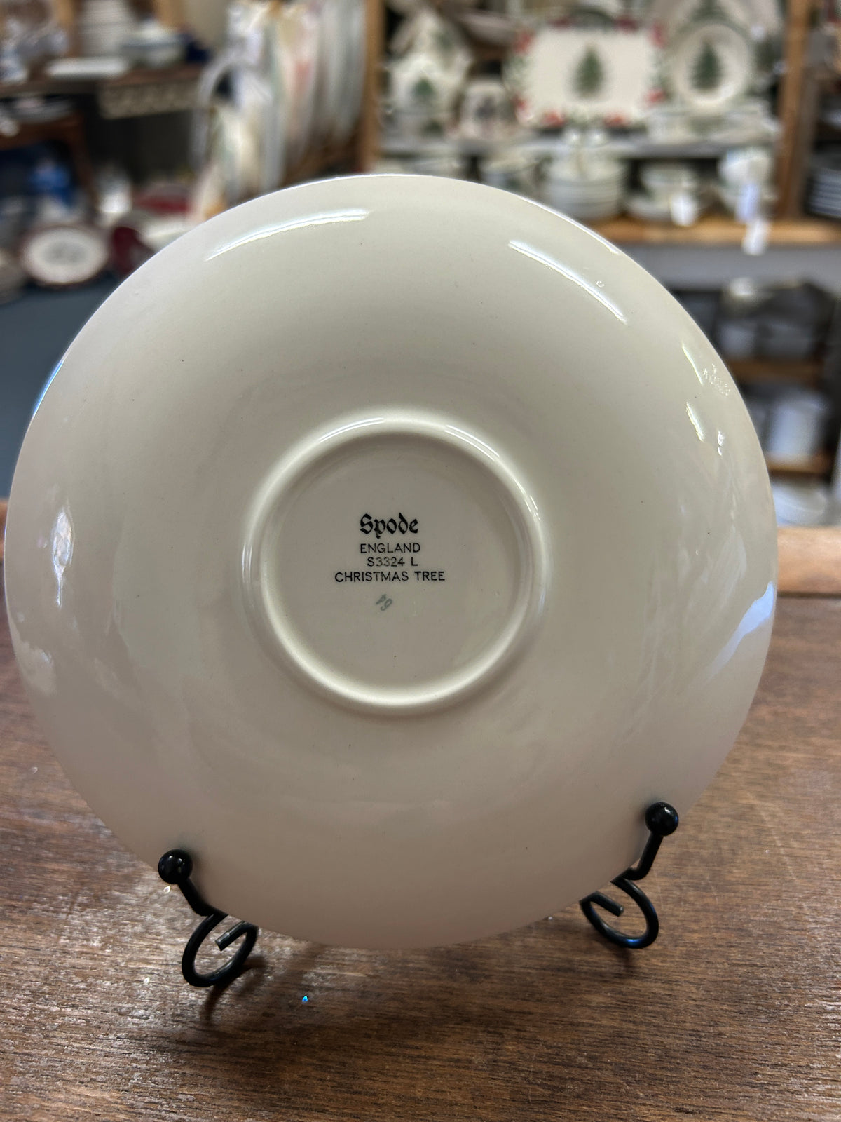 White Spode saucer plate bottom with Spode mark and “CHRISTMAS TREE” text