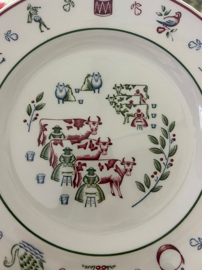 Decorative Christmas plate with multicolor farm-animal and greenery illustration, wide rim