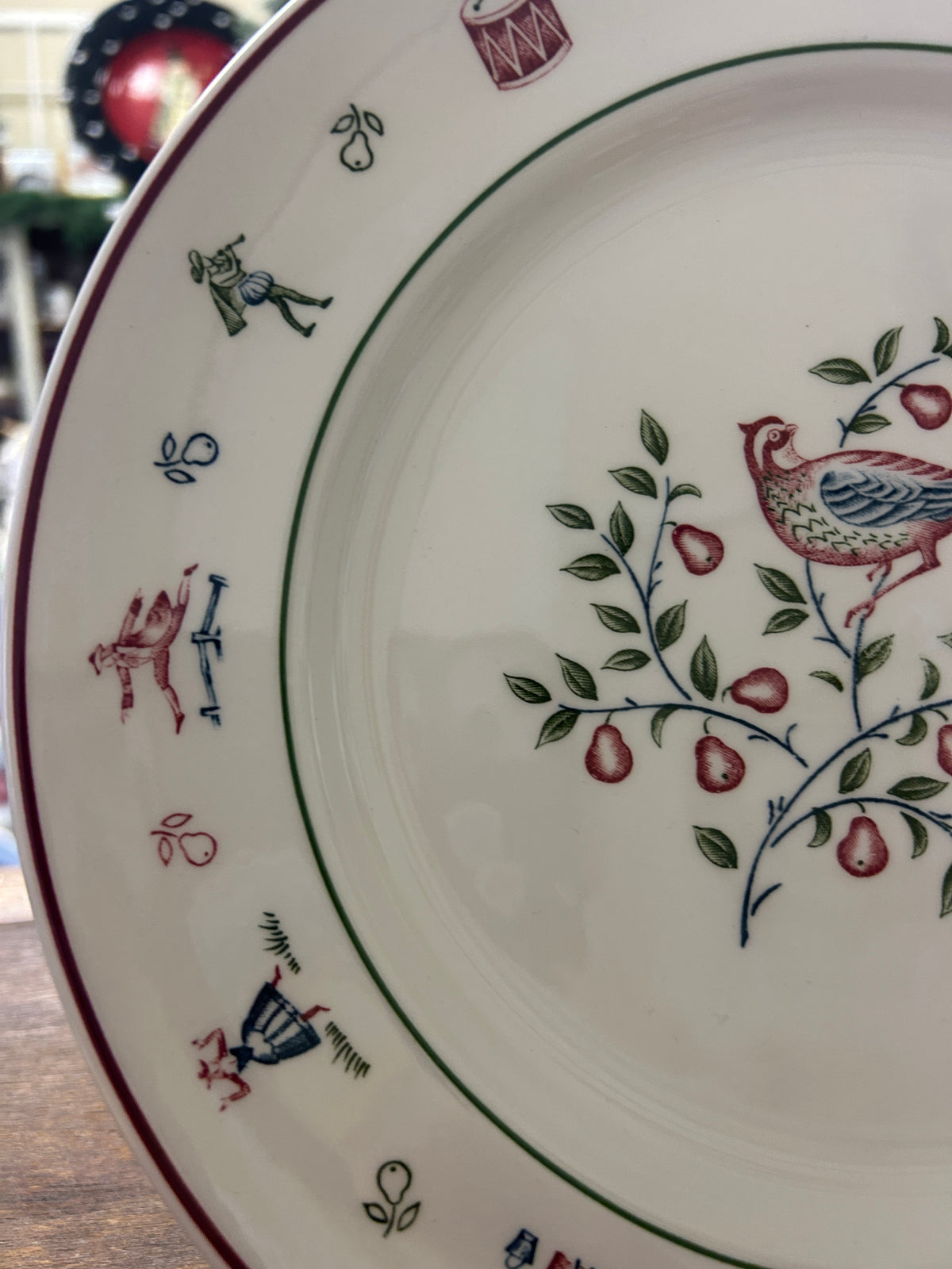 Johnson Bros Christmas plate rim with blue bird and floral sprig detail