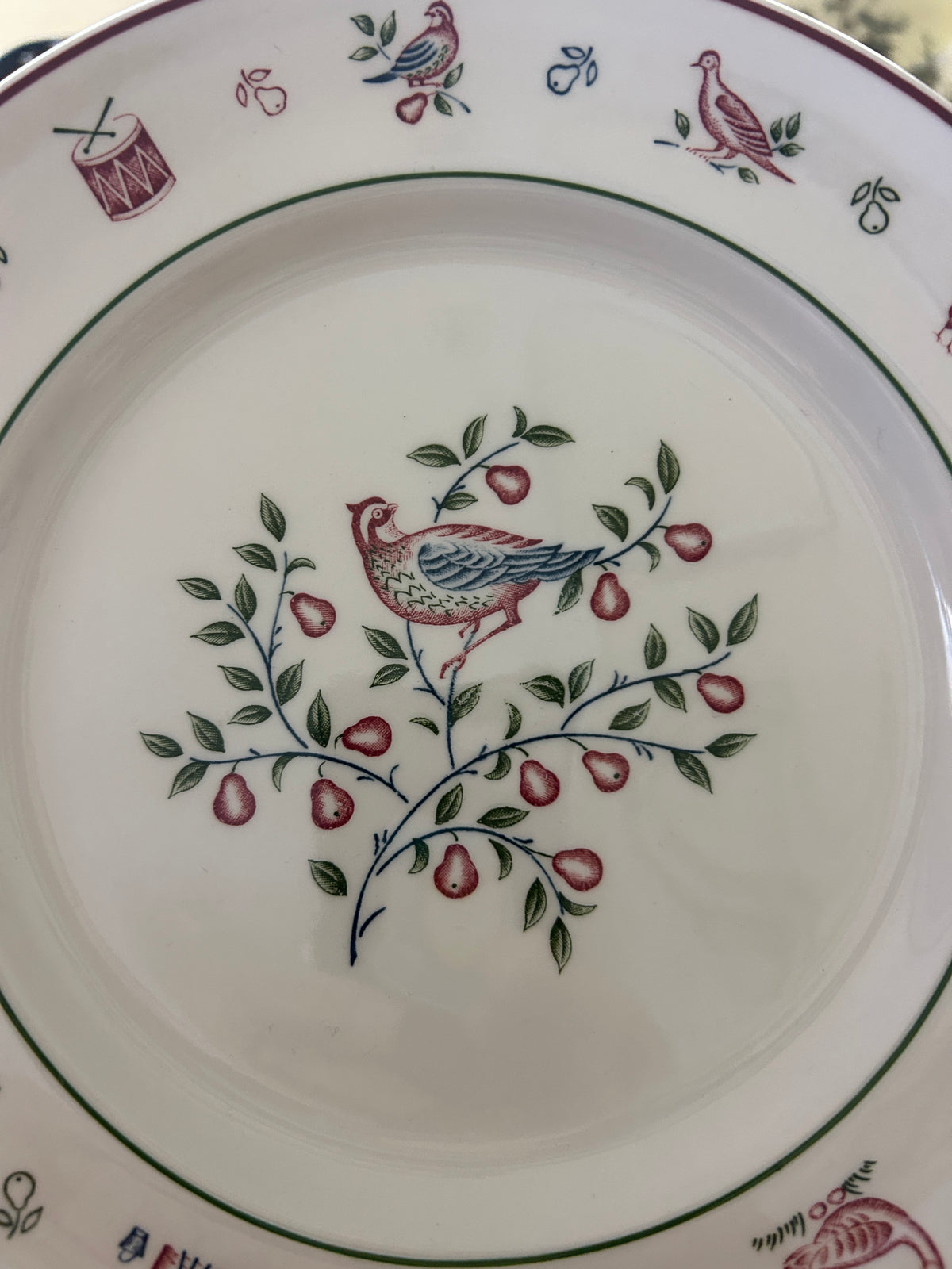 Johnson Bros Christmas ceramic plate center with red bird, branches, and green leaves