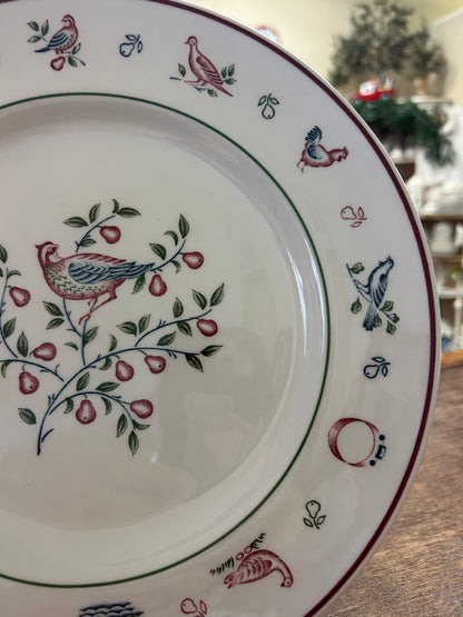 Johnson Bros Christmas plate with hanging bird and berry pattern around the edge