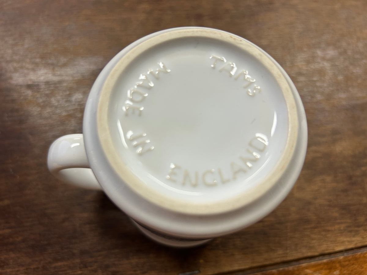 White ceramic mug base with embossed 'MADE IN ENGLAND' text