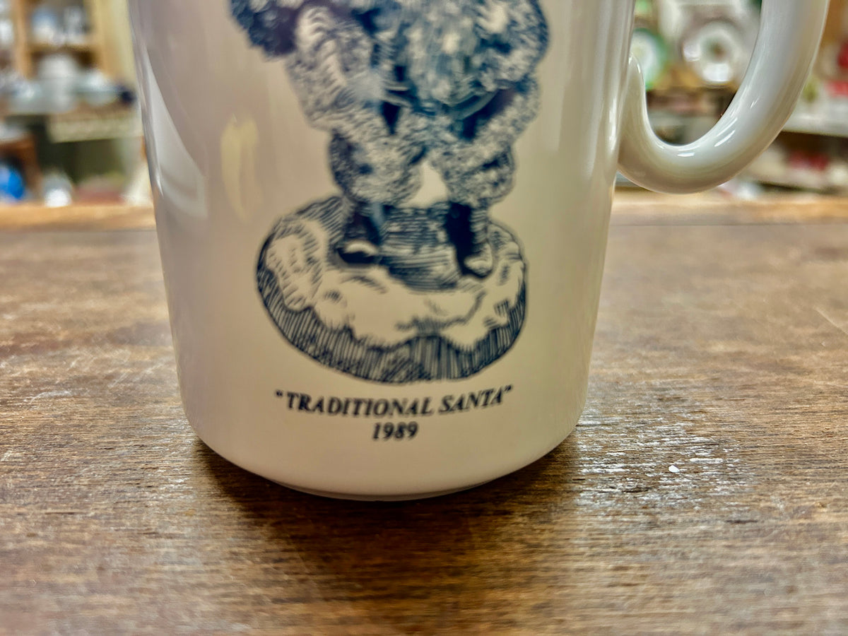 Ceramic mug bottom-front with dark blue “Traditional Santa” and “1989”