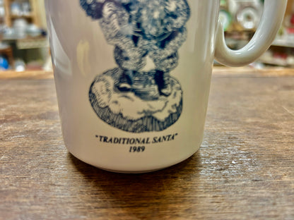 Ceramic mug bottom-front with dark blue “Traditional Santa” and “1989”