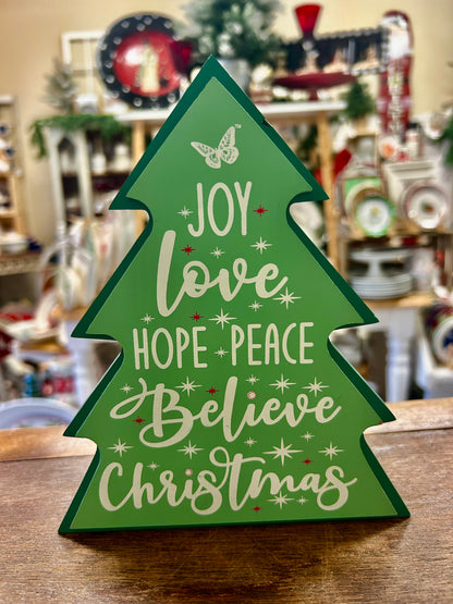 Green wooden Christmas tree ornament with festive 'Joy Love Hope Peace' lettering