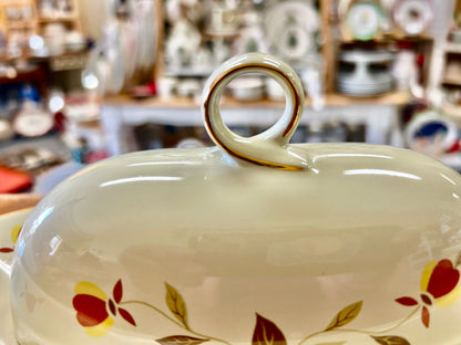 Ceramic butter dish lid with loop handle and autumn leaf floral accents, gold trim