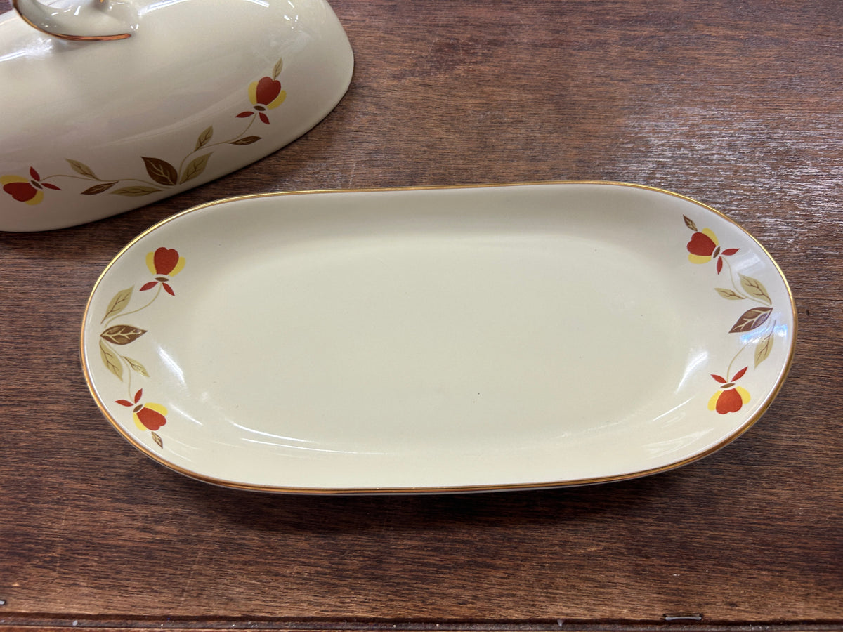 Empty ceramic oval butter dish tray with autumn leaf floral design and gold rim