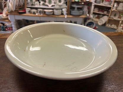 White ceramic pie plate interior, shallow dish shape