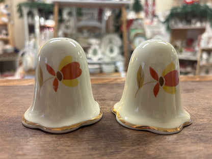 Ceramic salt and pepper shakers with autumn leaf floral pattern, white finish