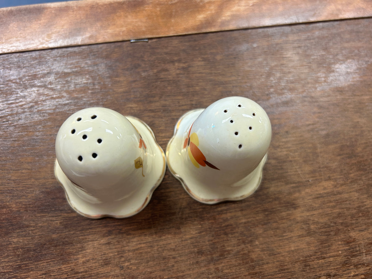 Ceramic autumn leaf salt and pepper shakers with perforated lids, yellow and red