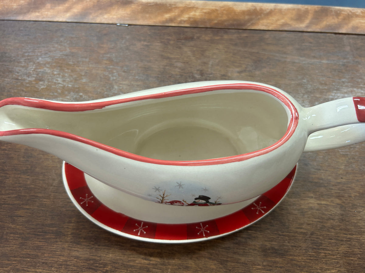 Royal Seasons gravy boat and underplate, showing the boat's open interior and red rim