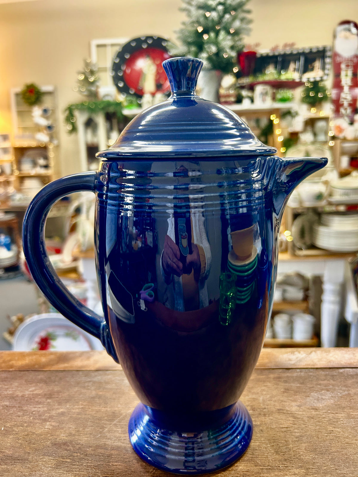 Cobalt blue Fiestaware coffee pot with ribbed body, lid, curved handle and spout