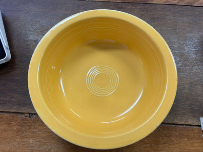 Fiestaware yellow rimmed bowl, 8.5 inches, shown from above with concentric base rings