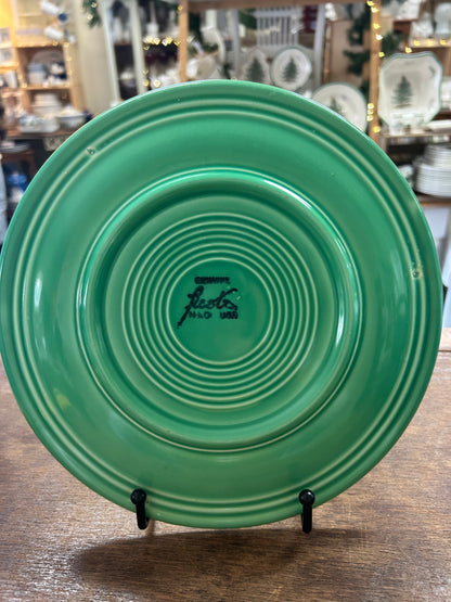 Fiestaware green plate, underside with concentric rings and maker's mark.