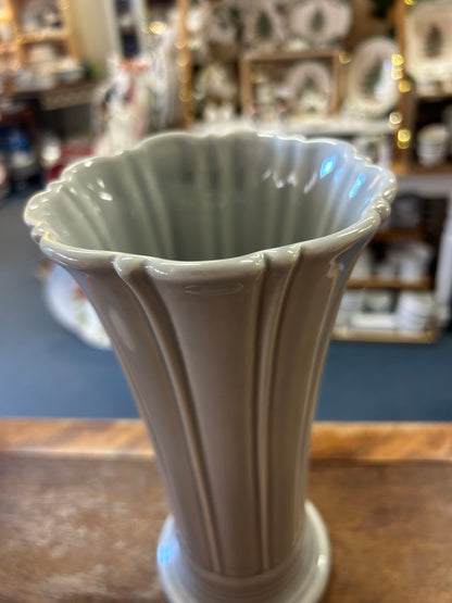 Fluted vase viewed from above, showing its scalloped rim and hollow interior