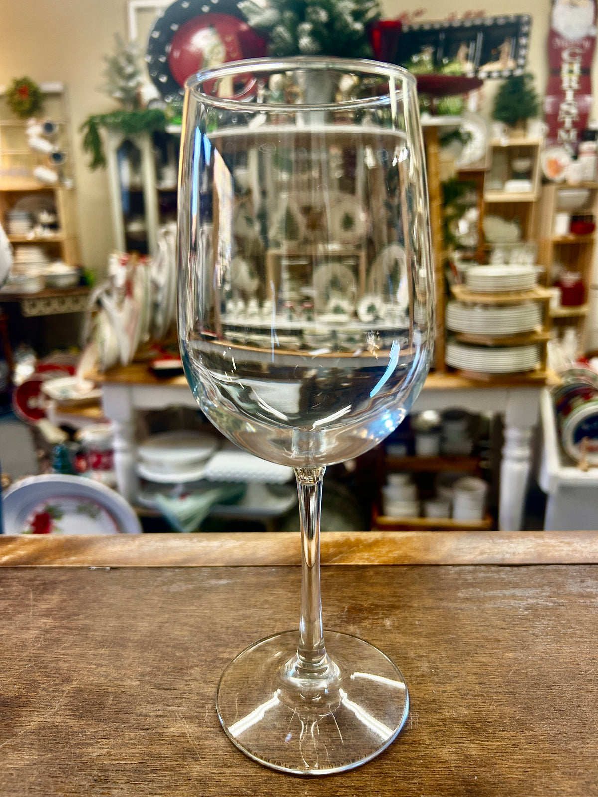 Clear wine glass with a tall bowl, slender stem, and round foot