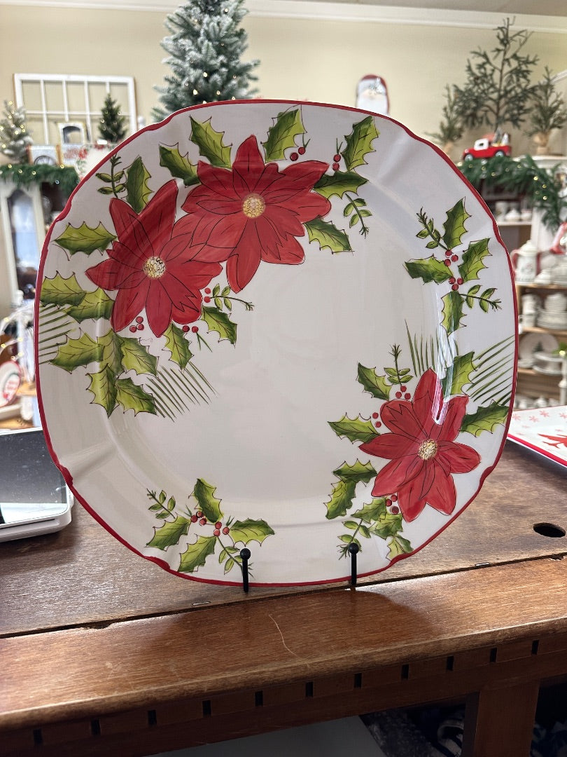 Holiday decorative ceramic platter with red poinsettia and green leaf border