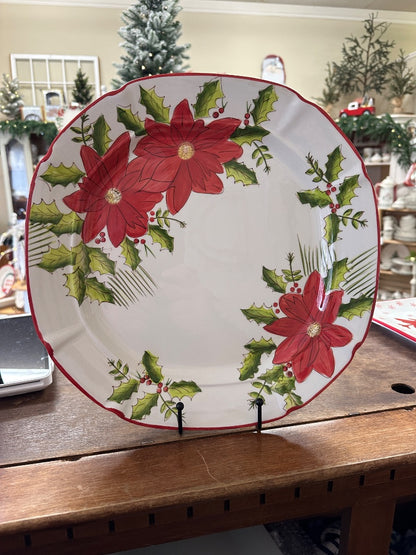 Holiday decorative ceramic platter with red poinsettia and green leaf border