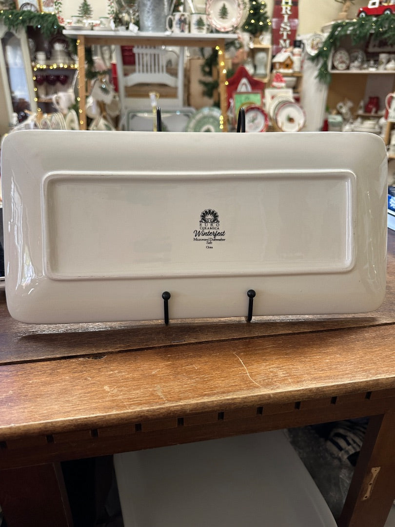 White ceramic Winterfest platter, rectangular with raised rim and center logo