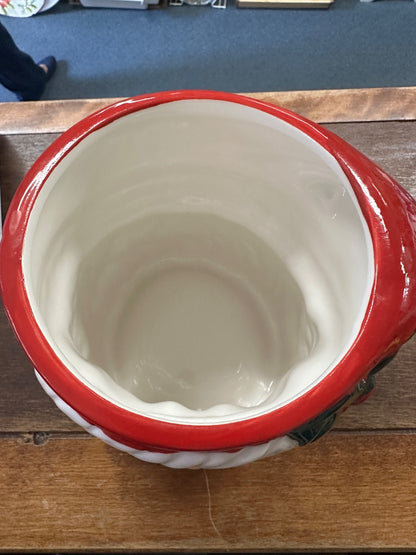 Red and white utensil crock mug interior with smooth white inner glaze